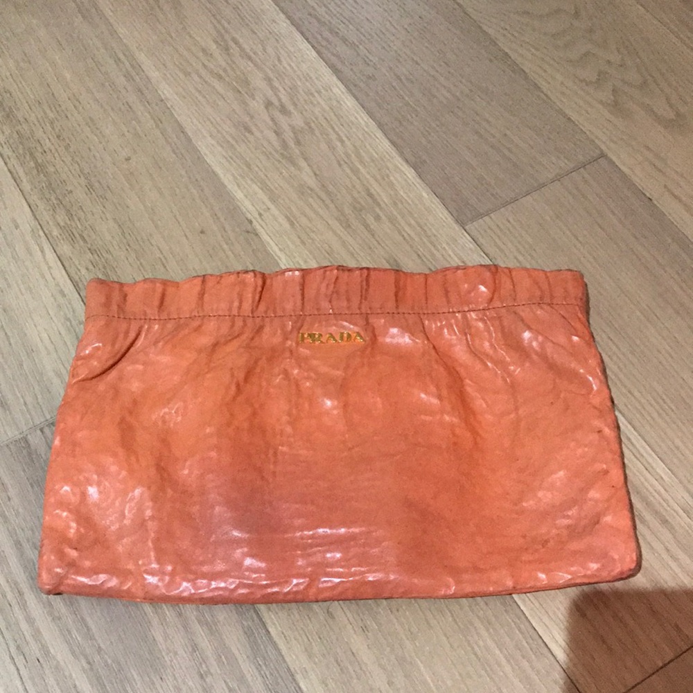 Prada orange clutch